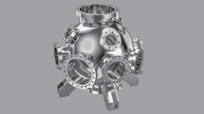 A side-by-side comparison of a stainless steel, an aluminum, and a clear acrylic vacuum chamber