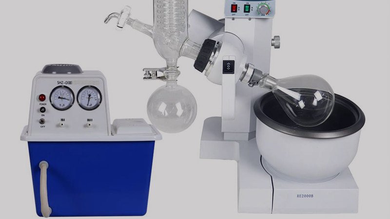 A table-top setup showing a rotary evaporator connected to a chemical-resistant diaphragm pump, highlighting a common and effective pairing